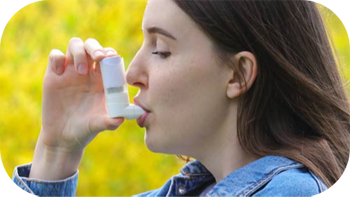 Girl using inhaler for Allergy - Asthma relief.